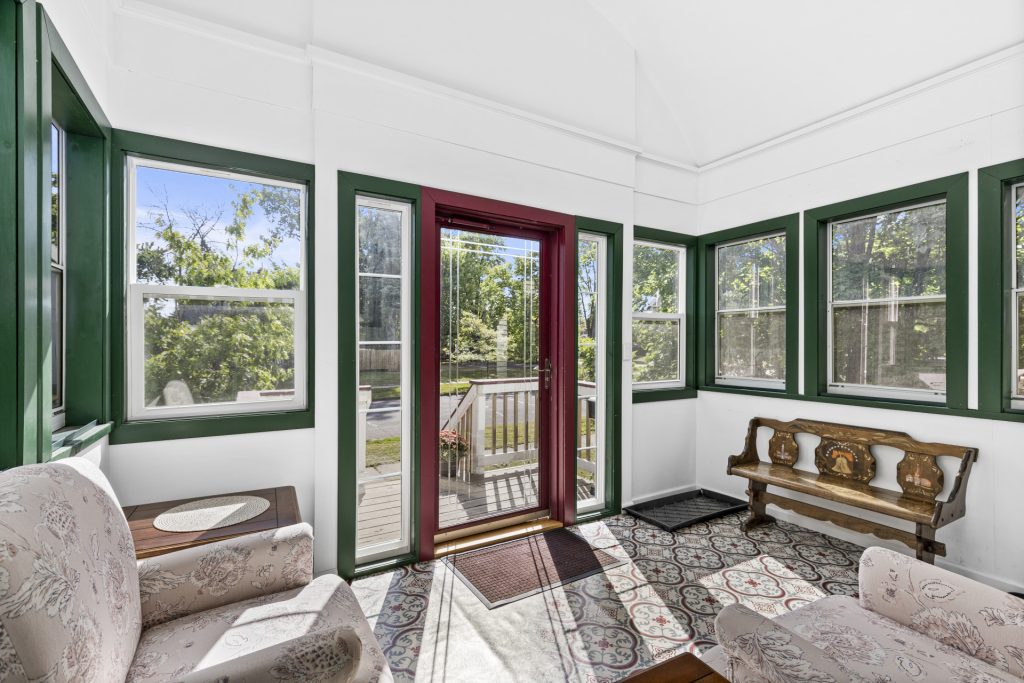 Windows on every side of the porch. So many windows to look out!