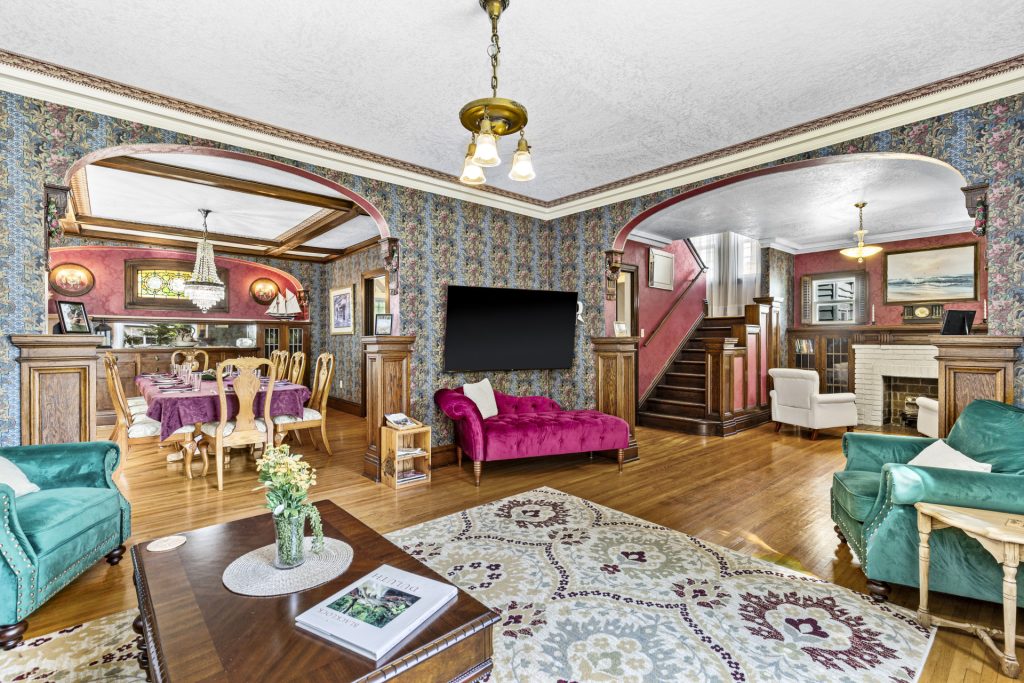Living room, dining room, fireside nook, and staircase all open to each other.