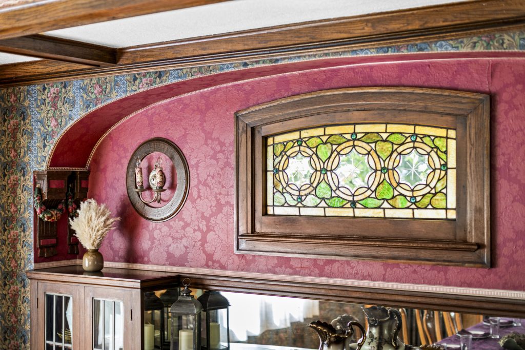 The stained glass window is original to the 1925 build.