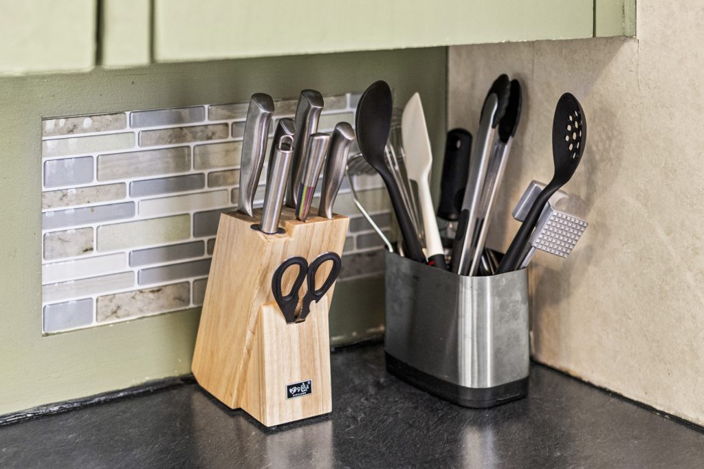 Kitchen is stocked with all of your standard kitchen utensils and tools.