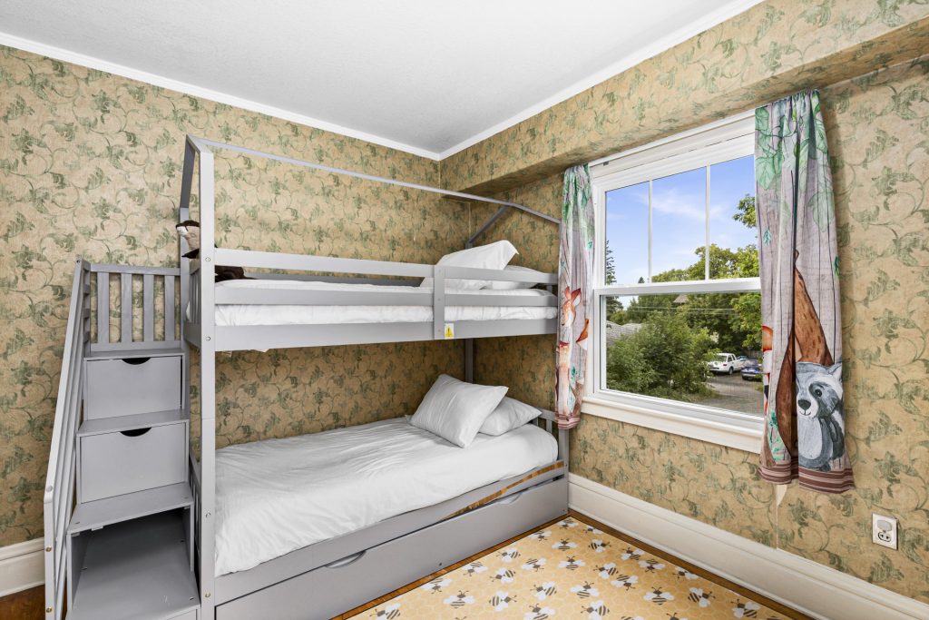 Fun themed kids bedroom complete with bunkbeds and a twin trundle underneath.
