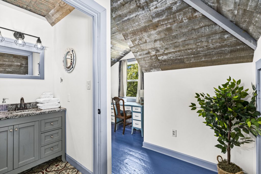 Third floor bath opens right into the bedroom and loft.