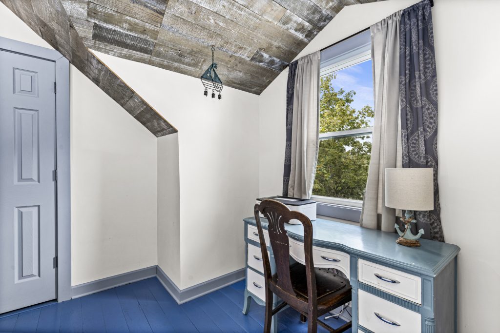 Built in desk and chair with a view from the third floor.