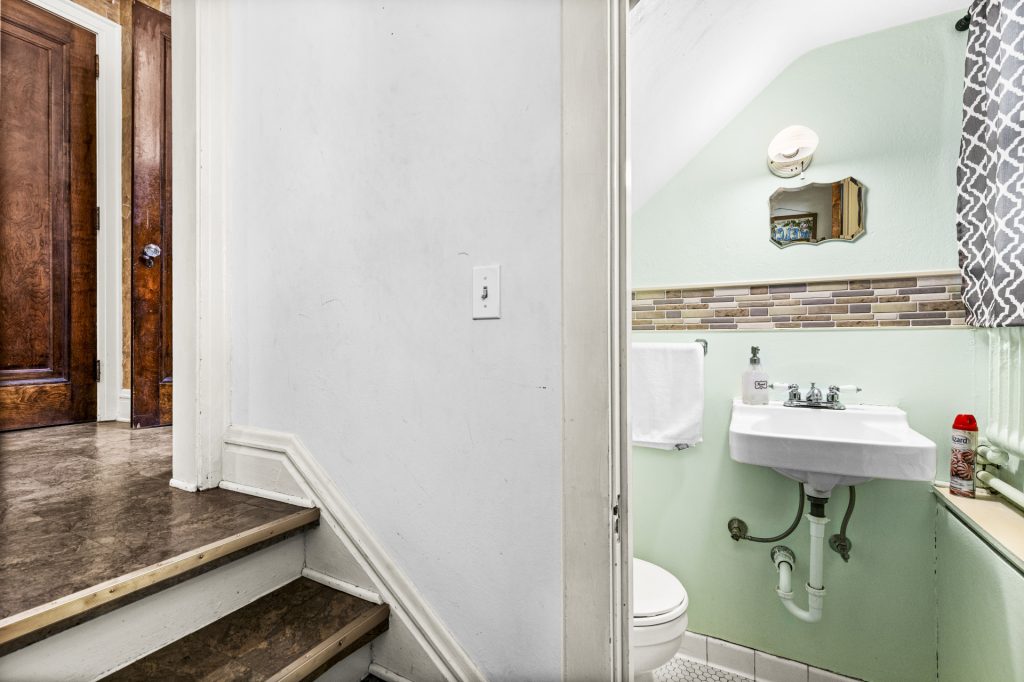 Convenient half bath just down the steps on the lower level.