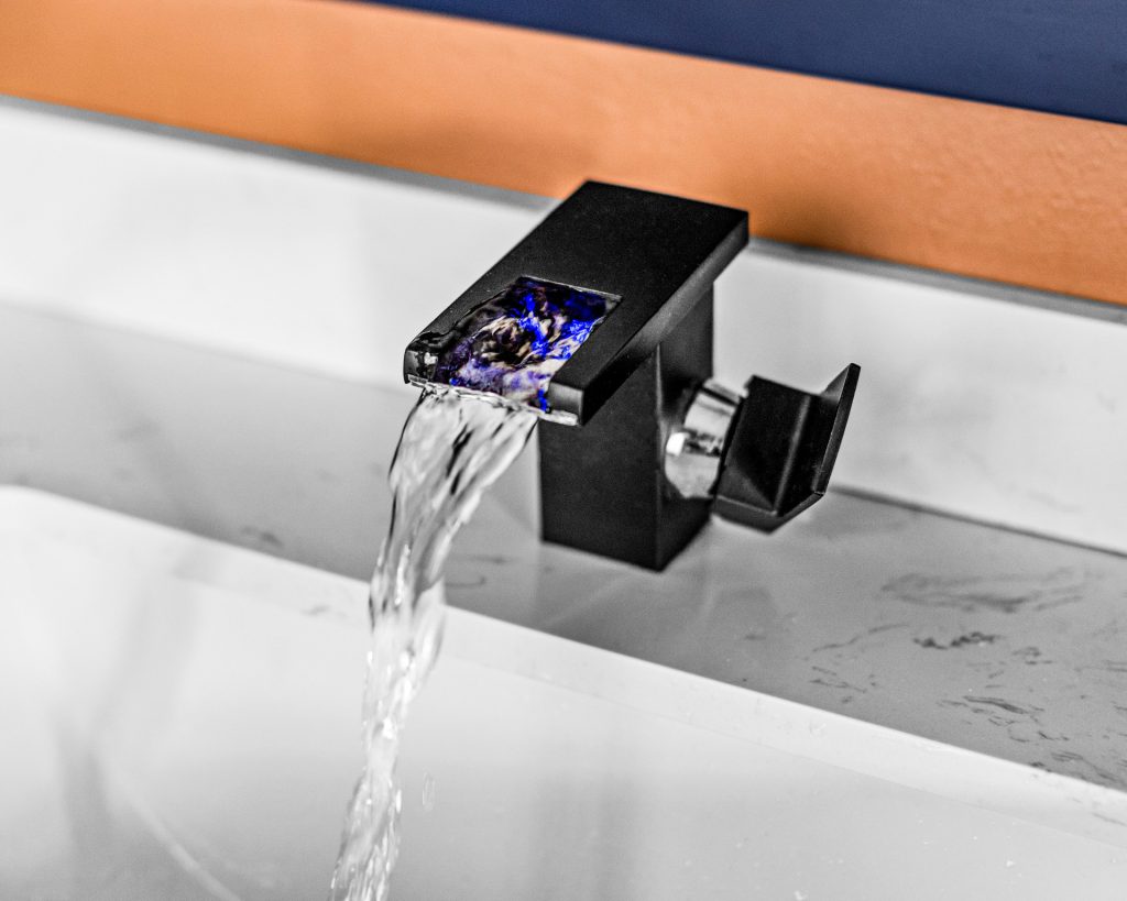 Our waterfall faucets light up and change color based on water temperature.