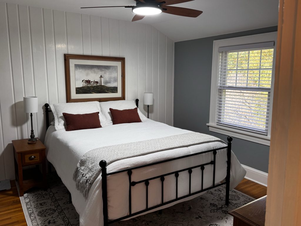 Heritage Bedroom on second floor. Window overlooking front yard/garden.