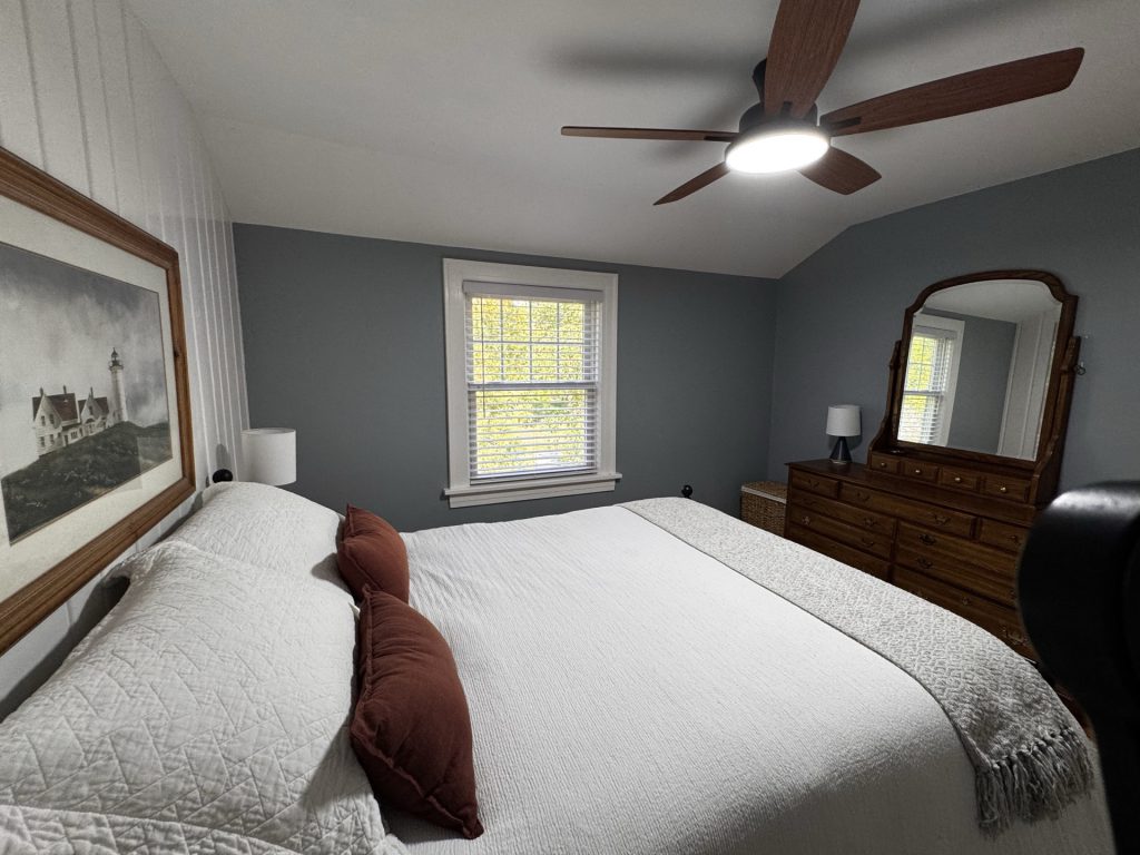 Heritage Bedroom on second floor. Window overlooking front yard/garden.