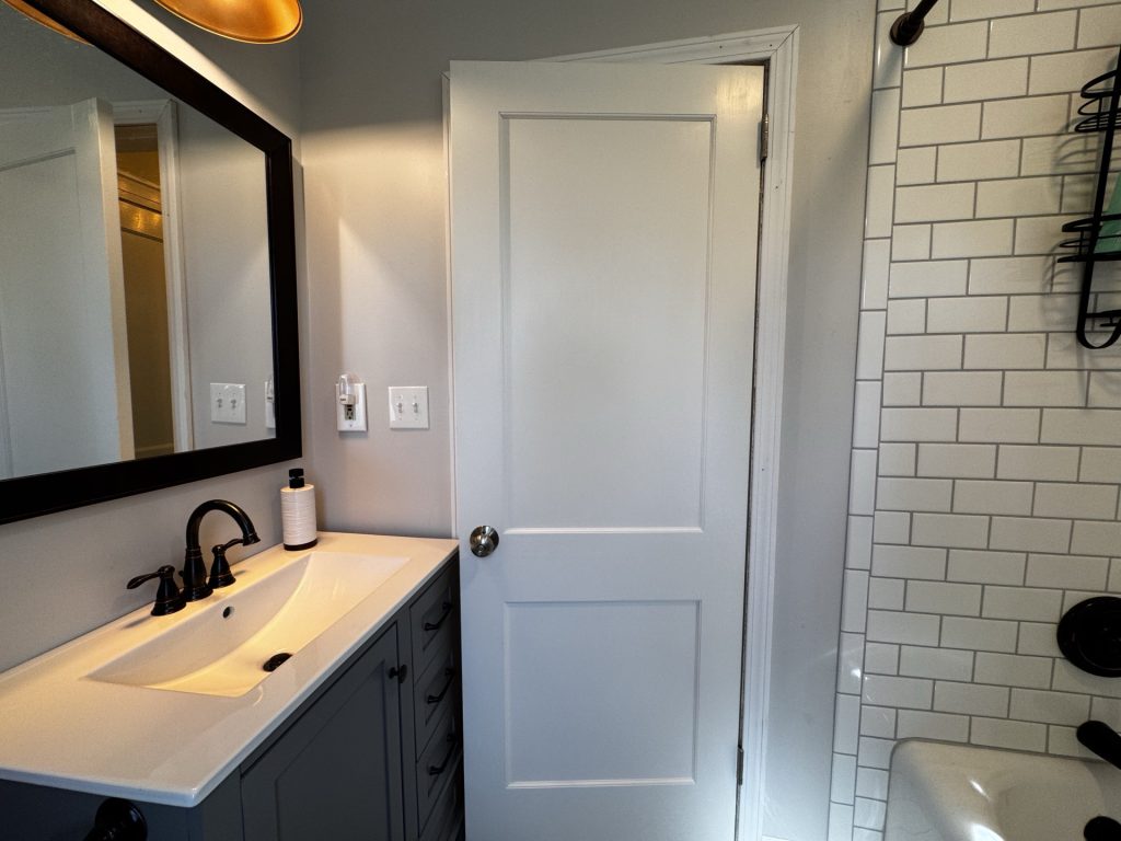Upstair full bathroom with shower and tub combo.