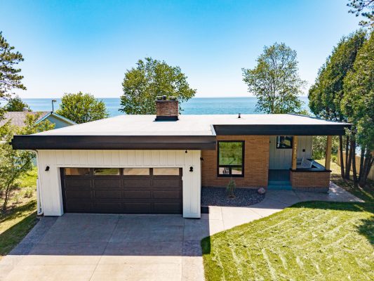 Sleek modern lines welcome you to your luxury lakefront basecamp.