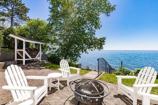 End the day at the waterfront patio, where Adirondack chairs and a crackling fire pit set the scene for lasting memories.