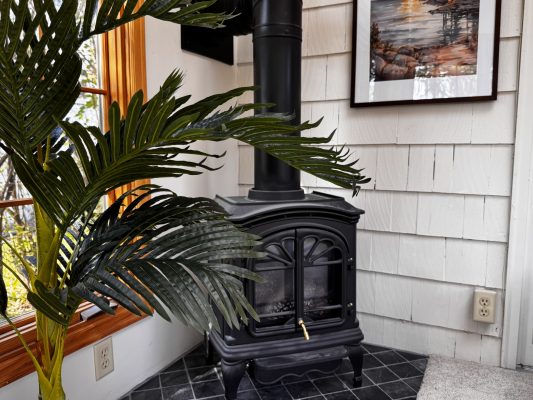Sunroom gas fireplace.