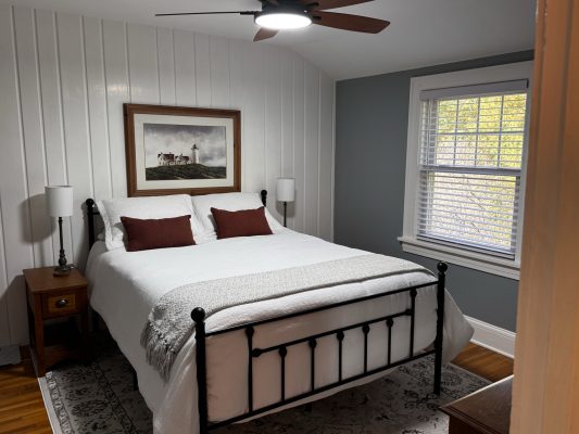 Heritage Bedroom on second floor. Window overlooking front yard/garden.