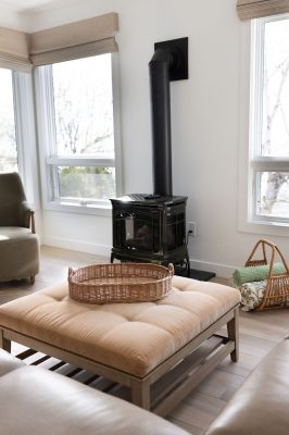 Relax in the lakeside living room with panoramic Lake Superior views.